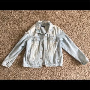 Ripped light wash jean jacket